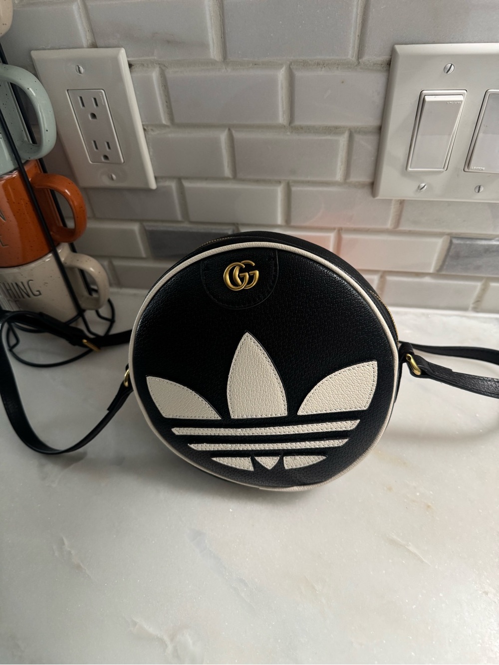 Gucci Adidas Black and White Round Crossbody Bag with Gold Logo